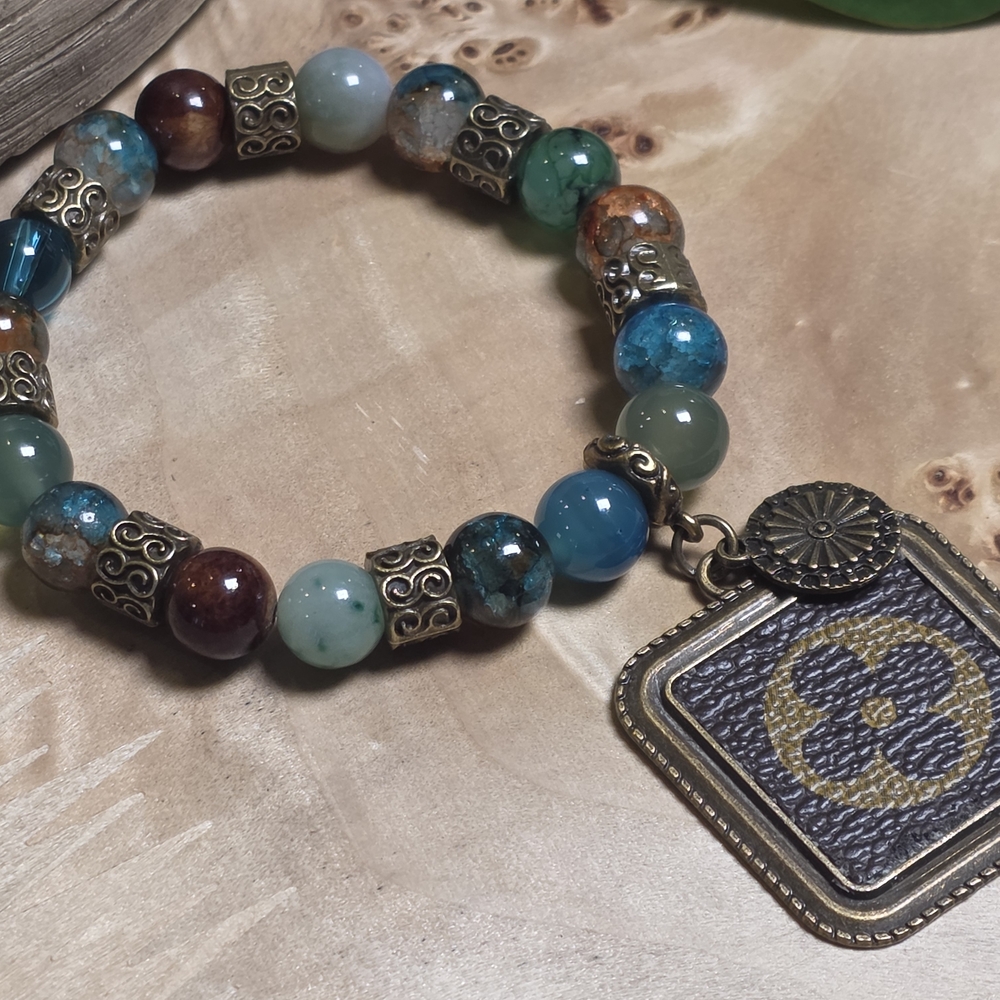Upcycled Elegant Beaded Bracelet with Charm